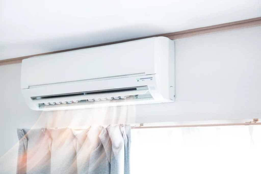 Mini Splits in Poway, CA 1 White air conditioner mounted on the wall.