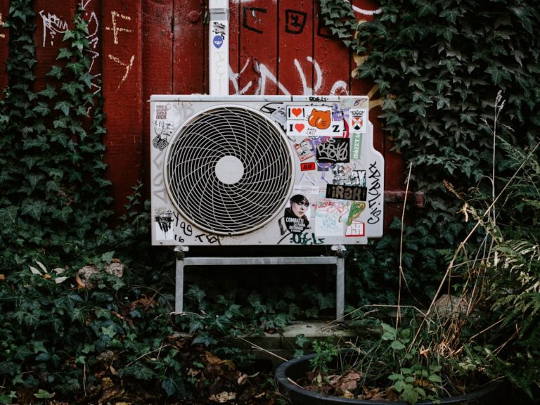 ac maintenance outdoor condenser unit in suburban San Diego backyard - ac maintenance
